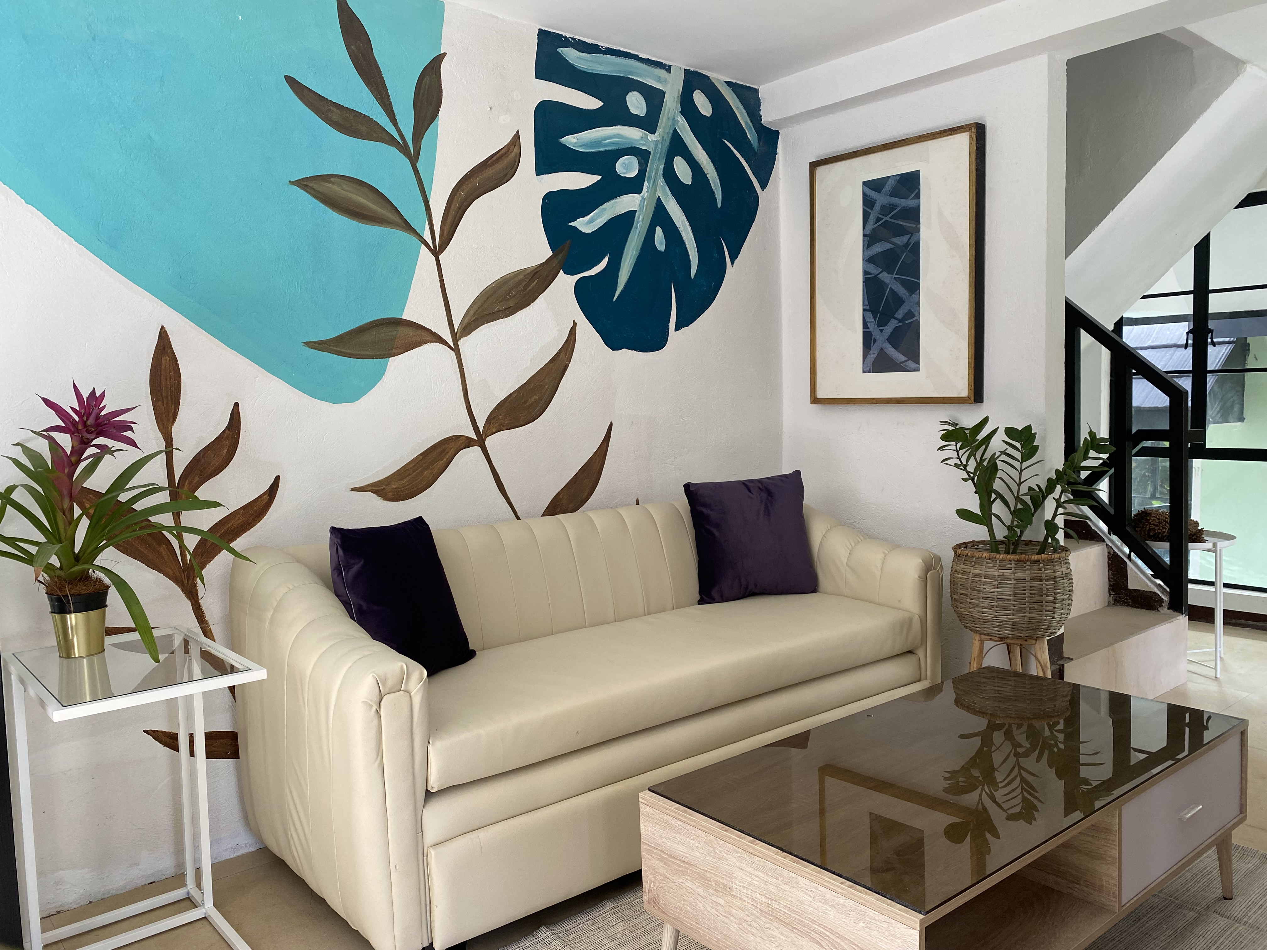 Living room with sofa and pullout bed.