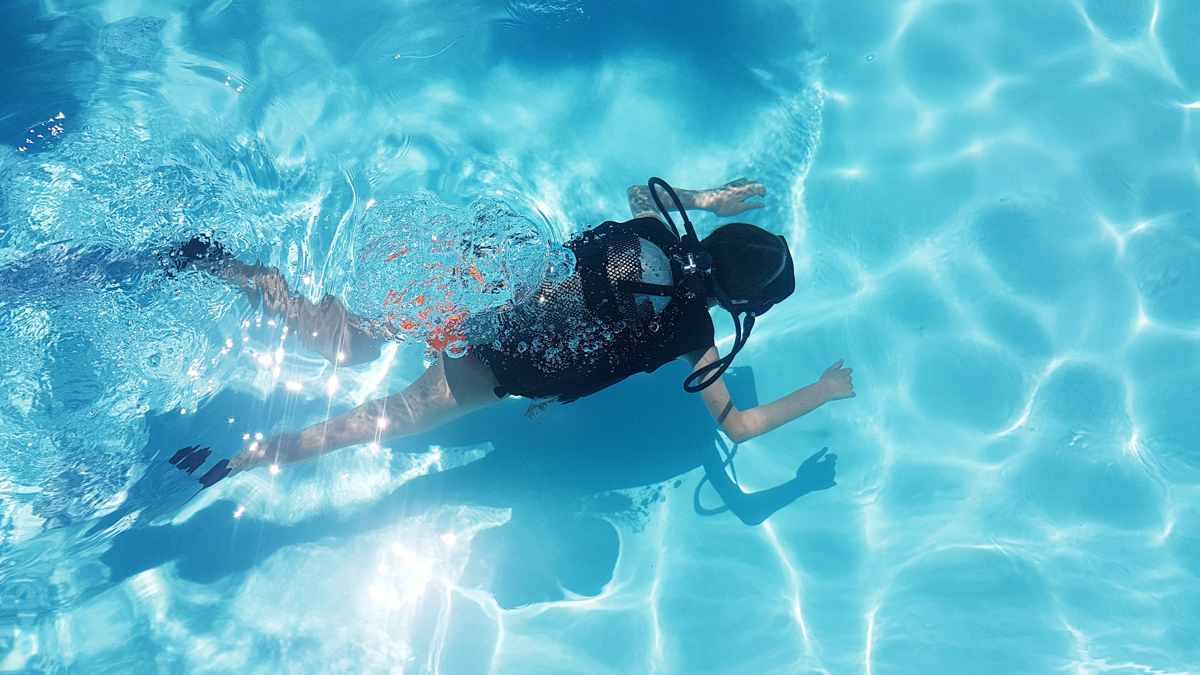 Complimentary scuba lessons in pool.