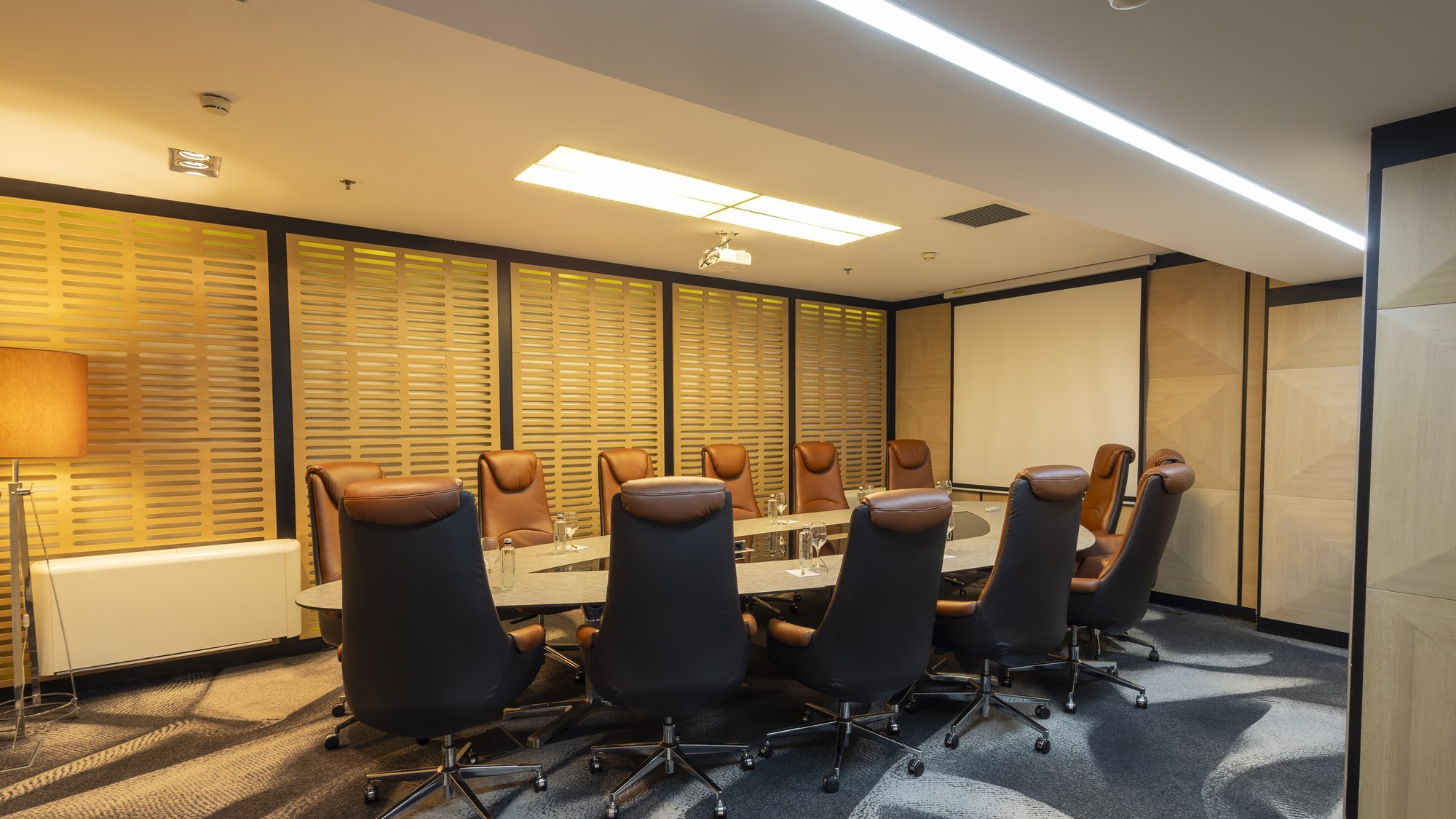 Executive Board Room B with boardroom table for 14