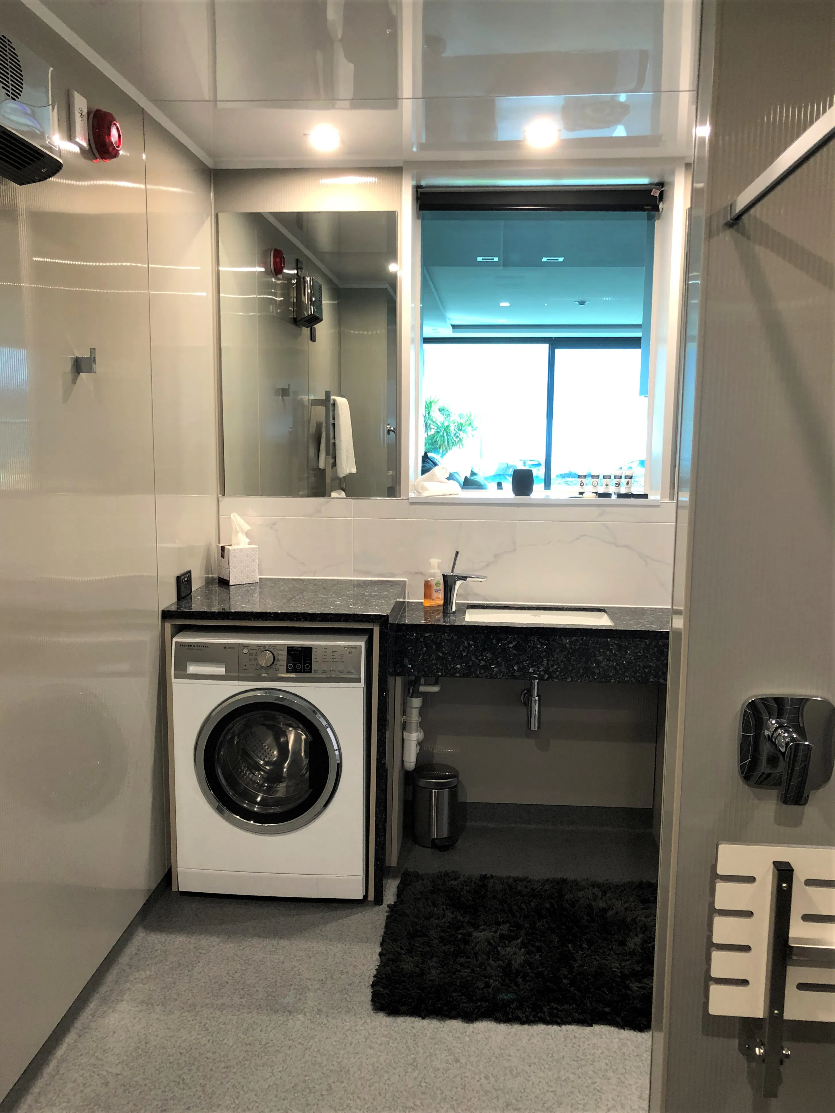 Tanara Access bathroom with washing machine