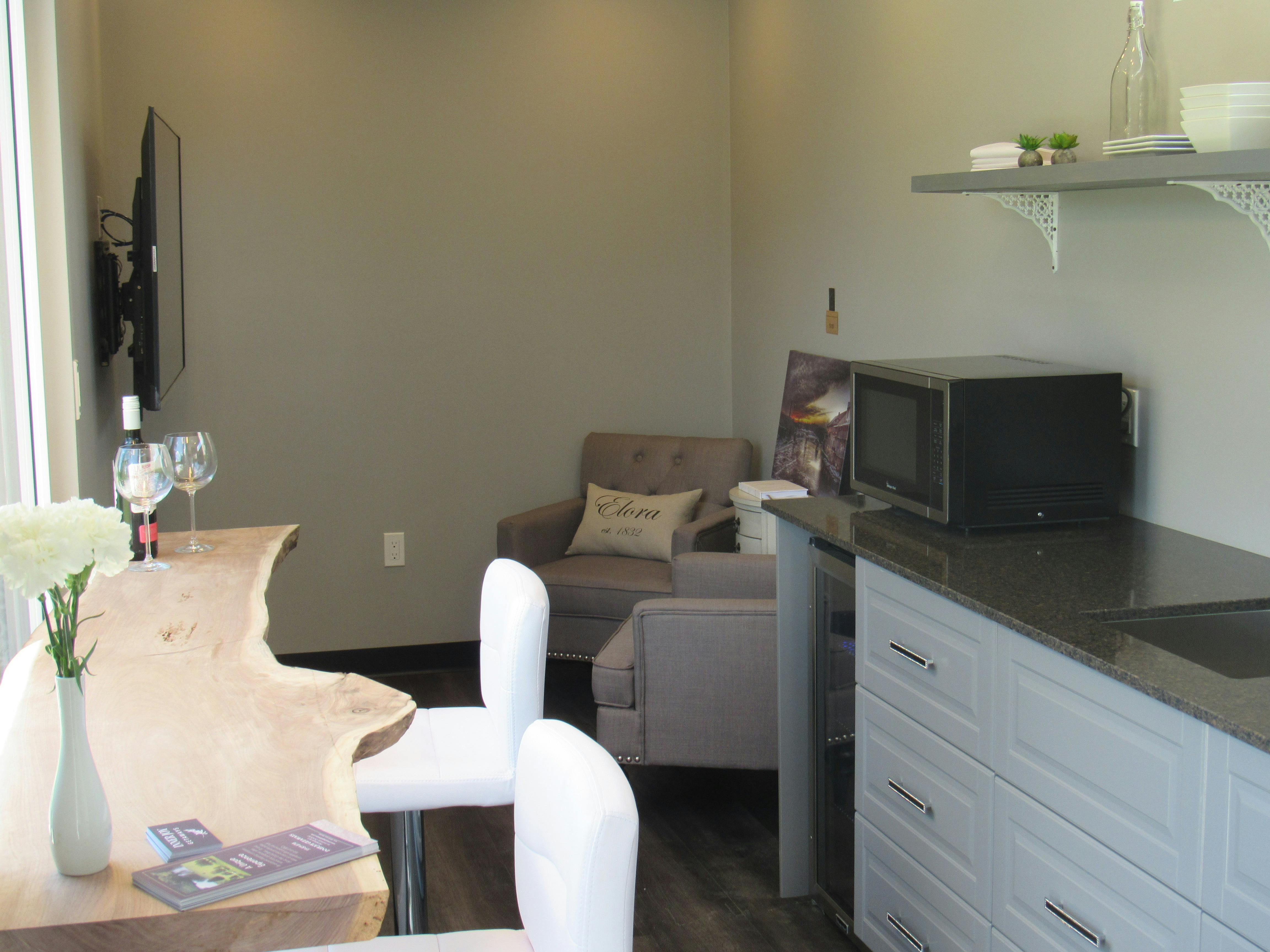Seating area in the Elora Suite. 55" Flat screen TV.