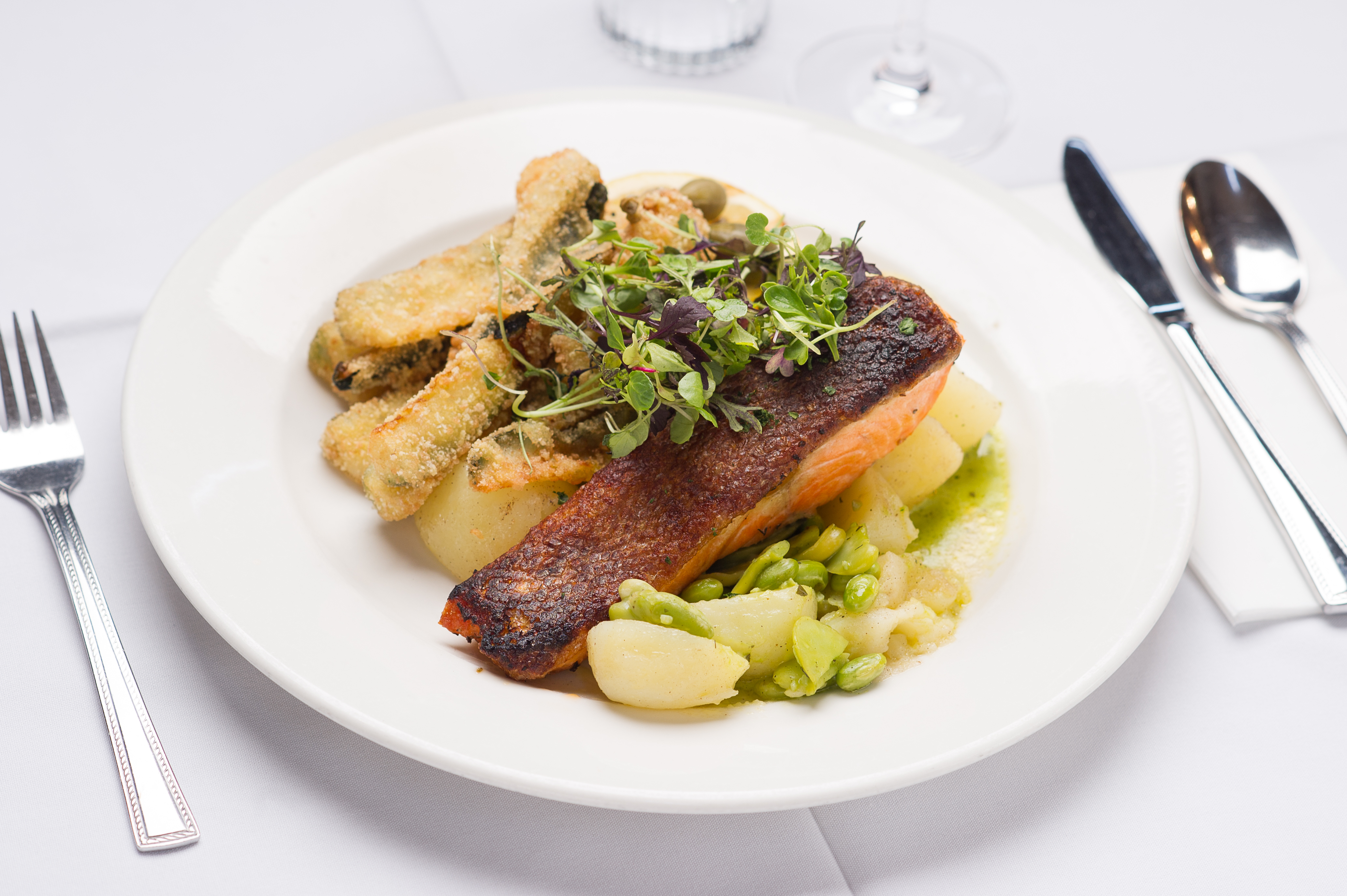 Crispy fried chicken tenders, vibrant slaw, zesty dip, lime.