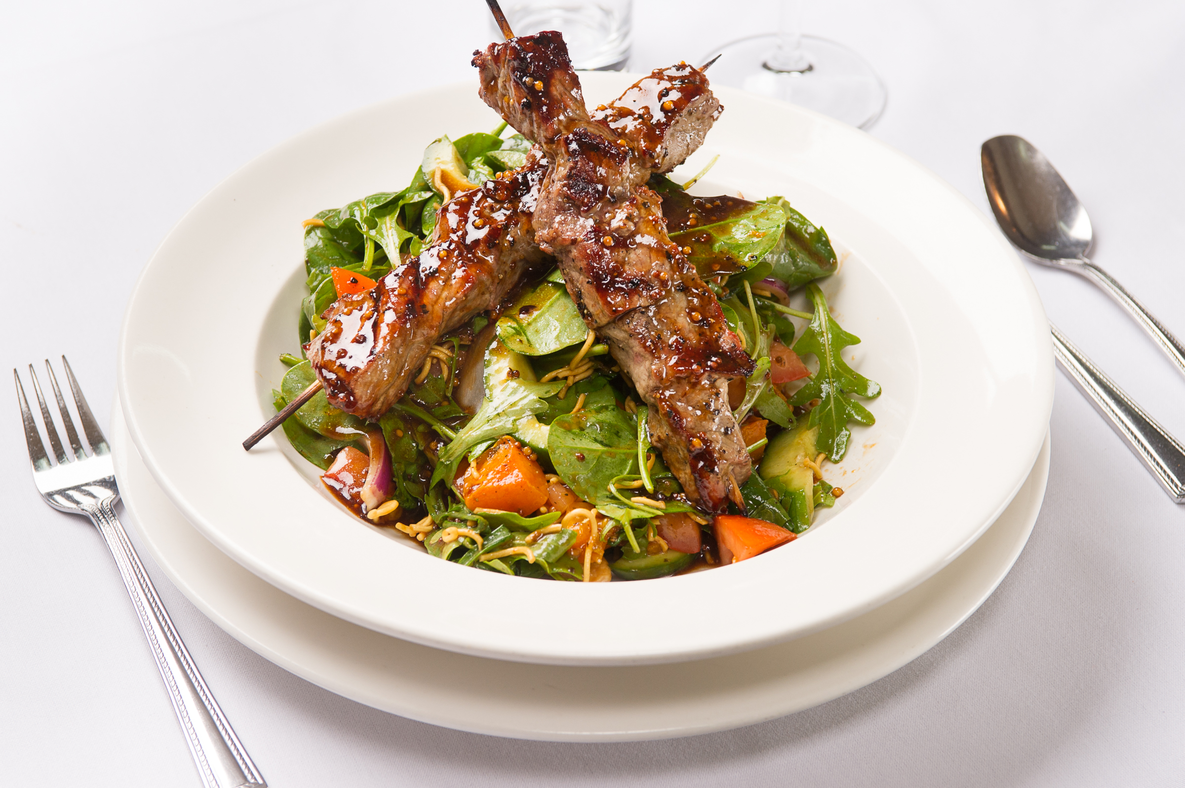 Duck skewers, Asian marinade, salad