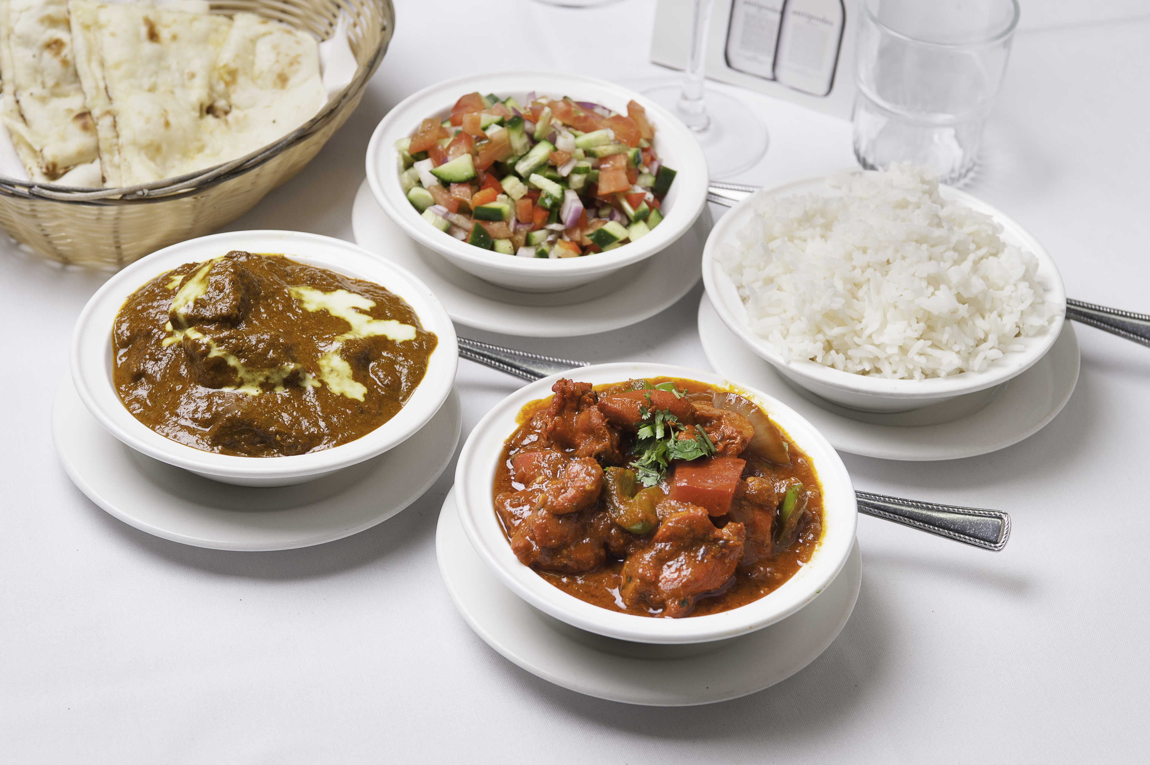 Indian food bliss! Beef Korma with cream, Chicken Tikka Masala, Kachumber & Jasmine Rice.