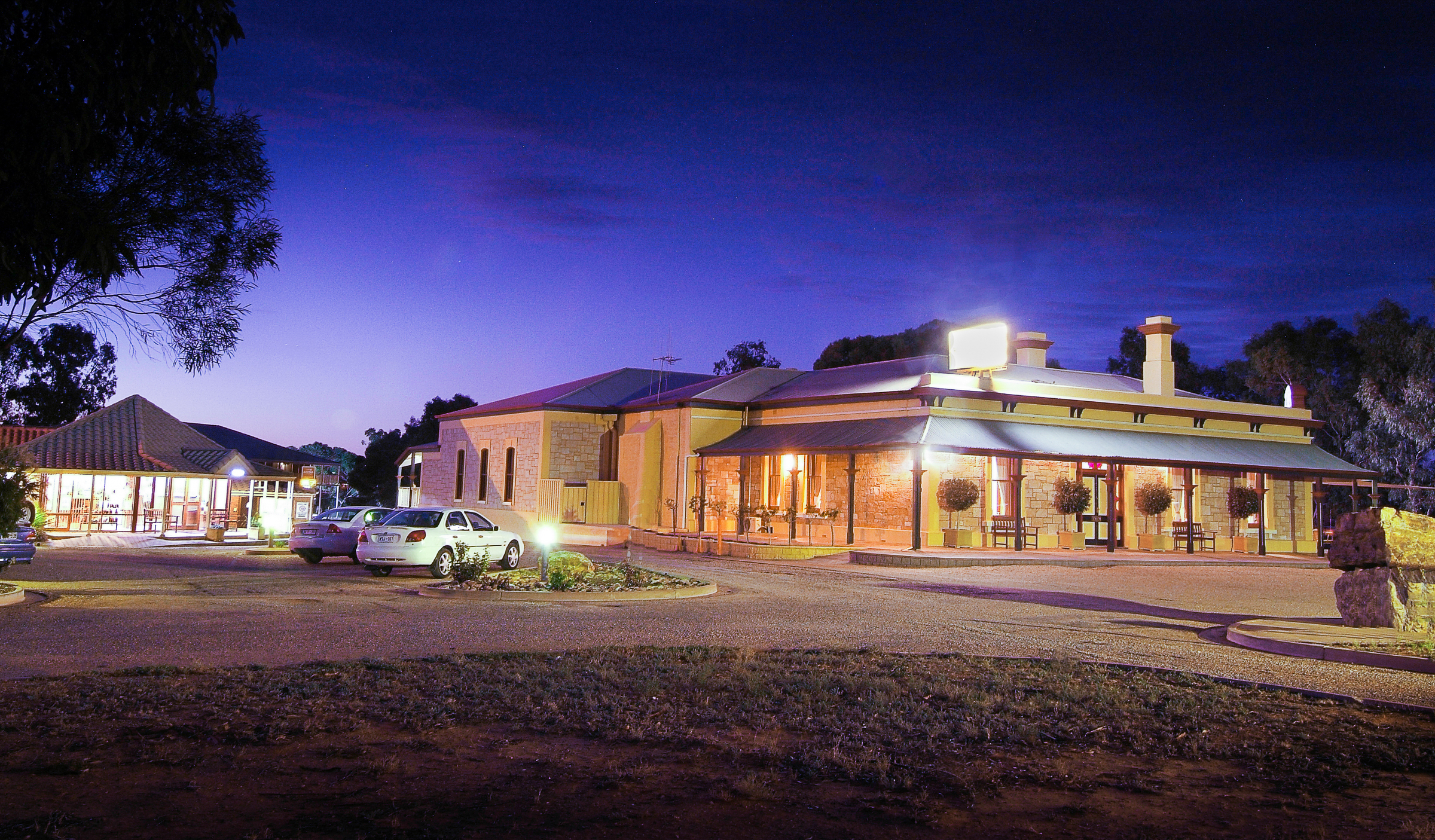 Golden hour at Standpipe Restaurant & Motor Inn. A peaceful retreat awaits.