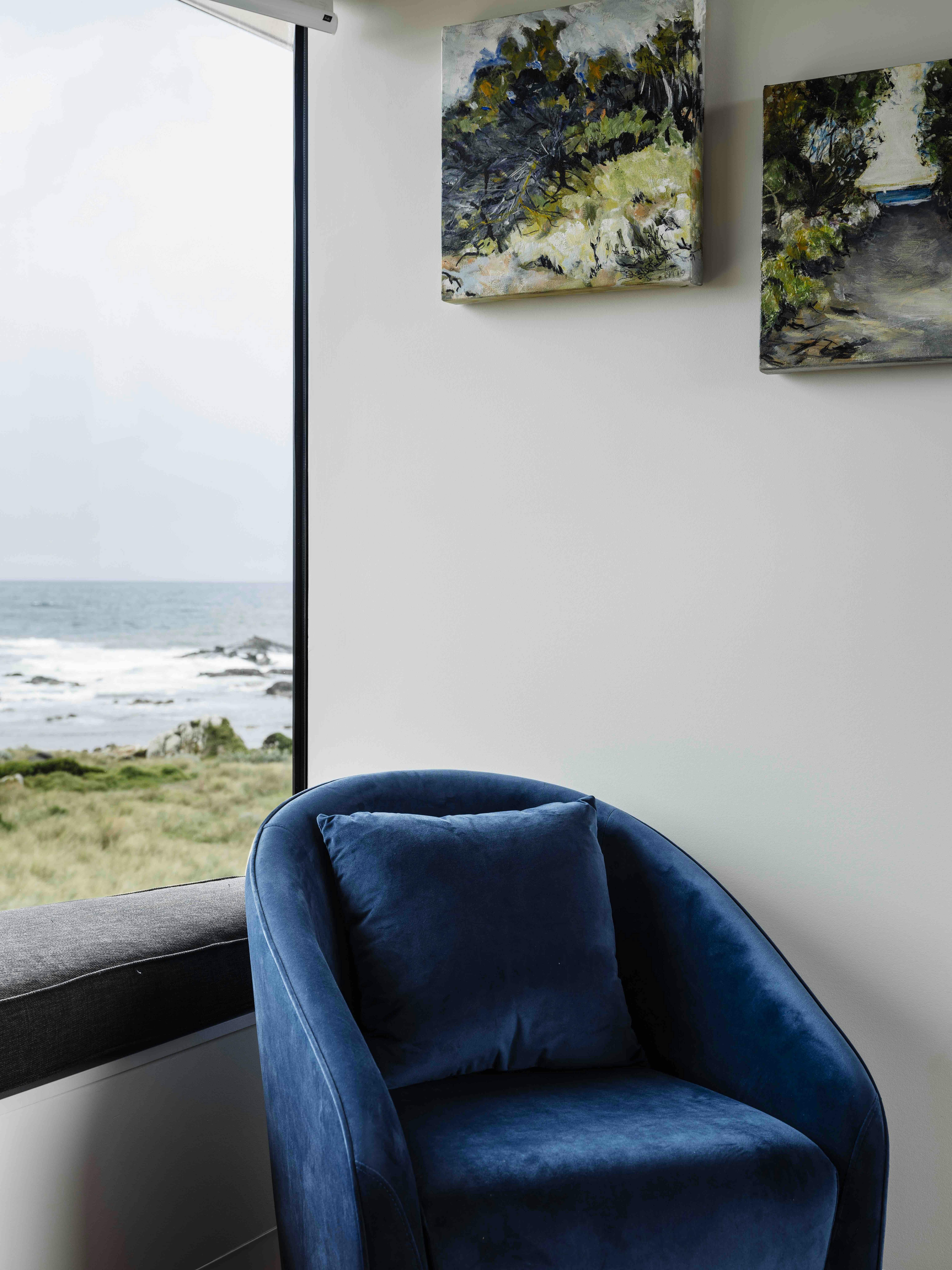 stylish blue sofa in Pimelea Bedroom
