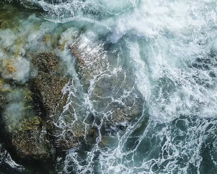 Ocean waves crashing on rock