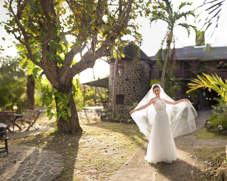 Bride In Front of the Rental Estate