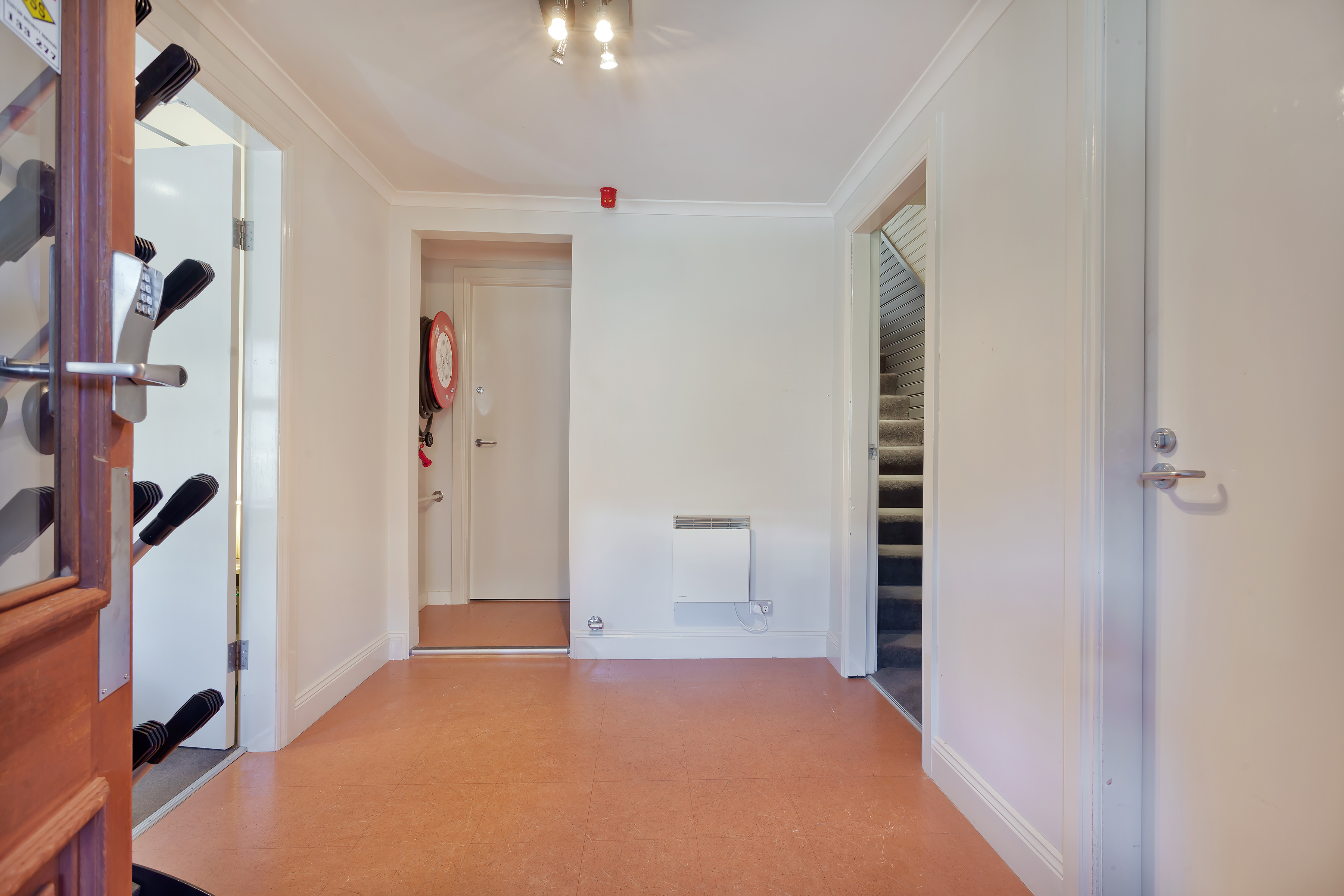 Bottom foyer with boot drying rack