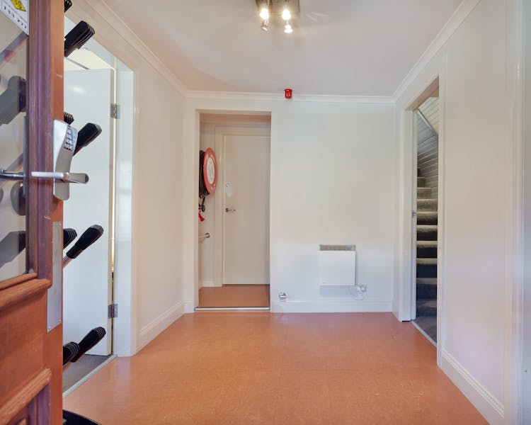Bottom foyer with boot drying rack