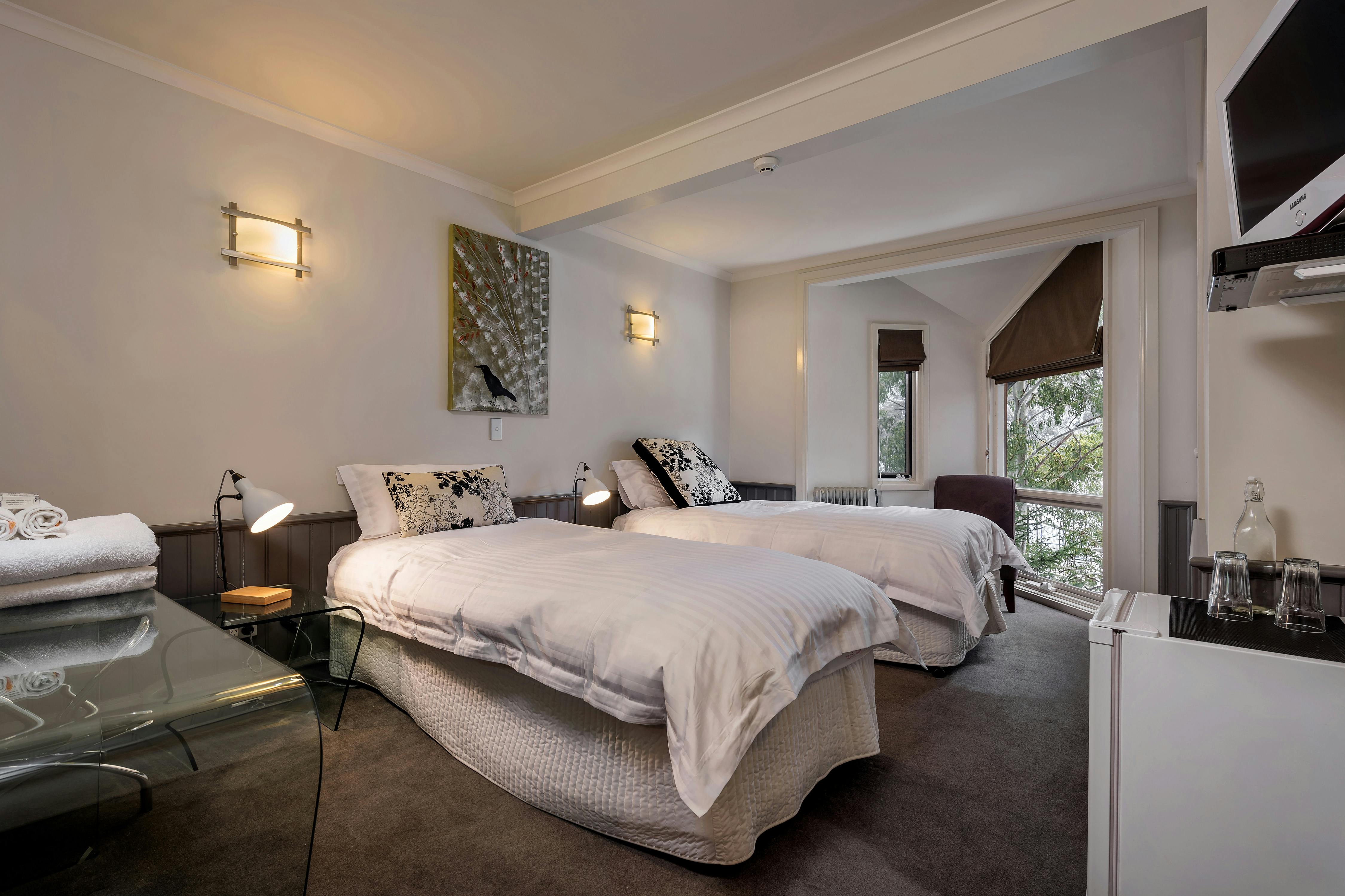 King Room 1 - 2 Singles or king double configuration.