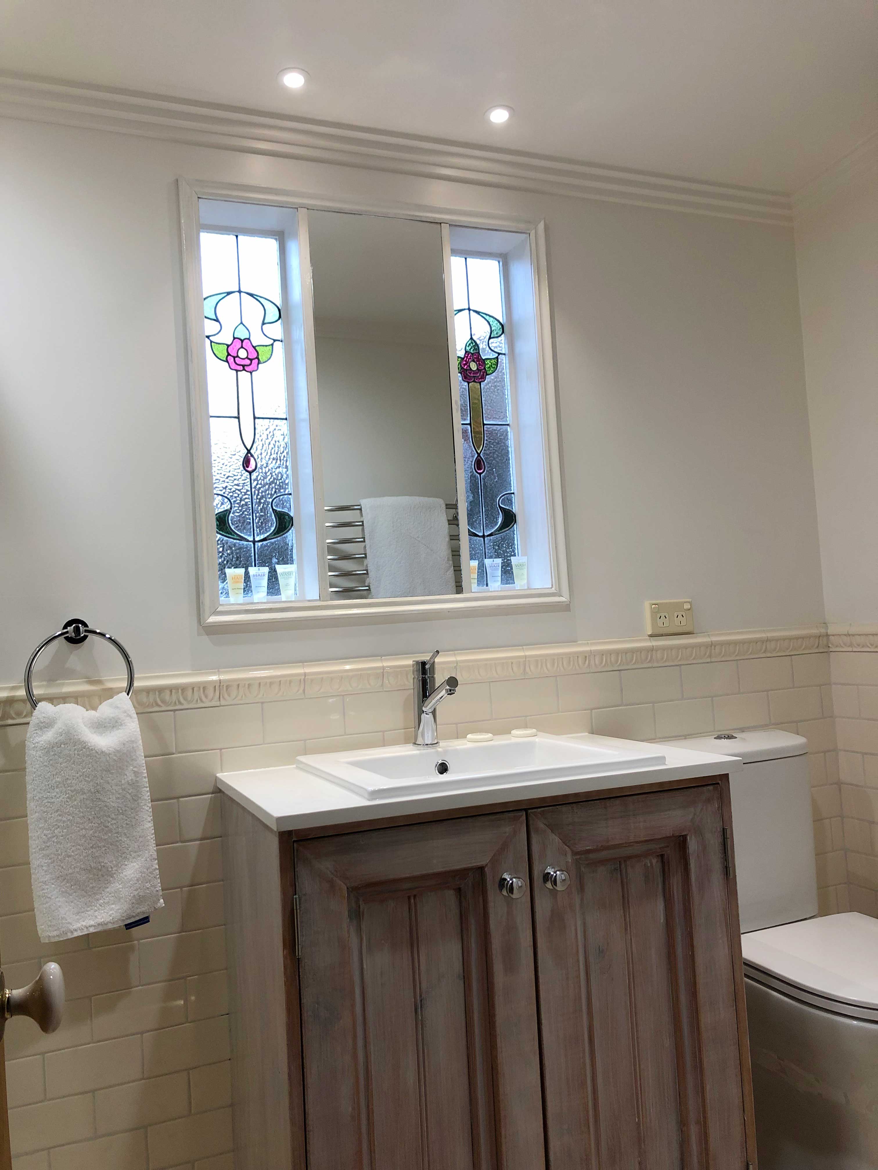 Milk Separator room - Bathroom including stained glass windows. Bon Accord B&B, Sale, Gippsland.