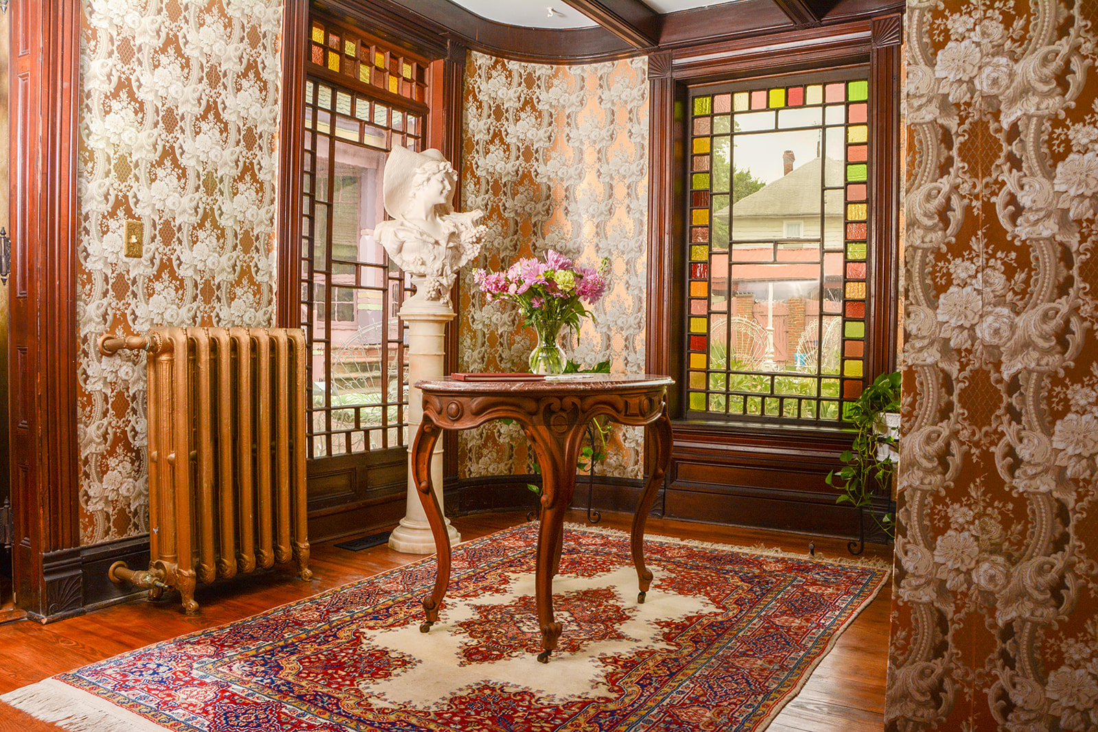 Guest rear entry area with bust of Rebecca.