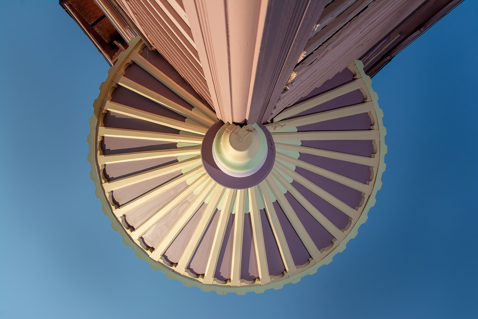 View of the wood ornamentation under the oreal on the corner of the Towers B&B.