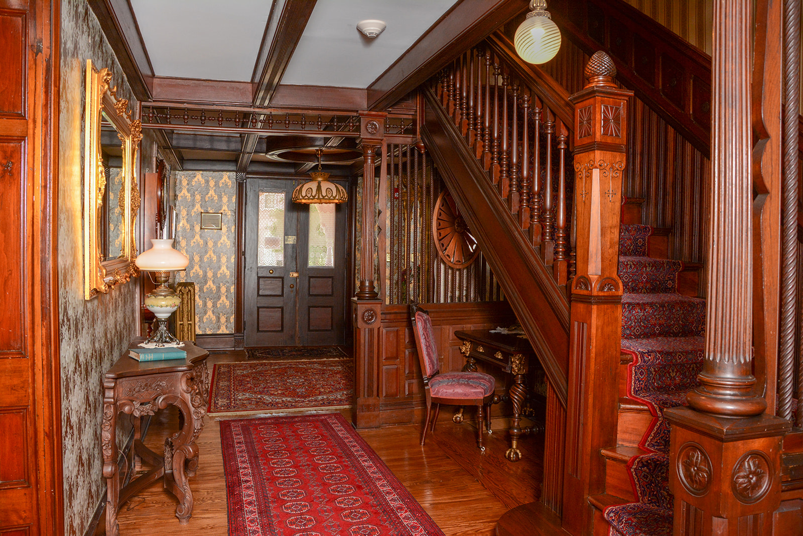 Entry hall with staircase.