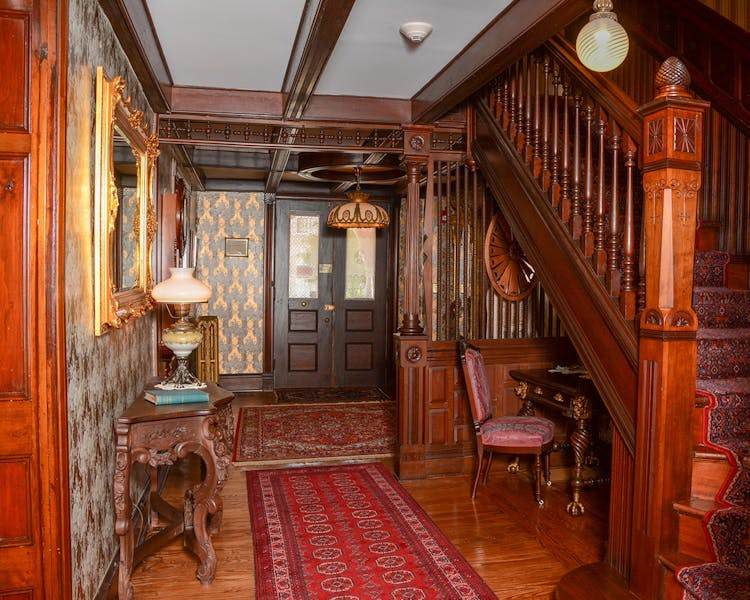 Entry hall with staircase.