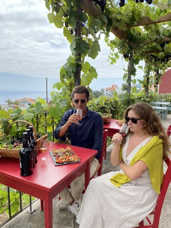 Winetasting at Quinta das Vinhas. Tasting Justino's wines with some lovely snacks, overlooking the vineyard and the sea.