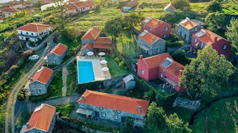 Arial view of Mezaine Cottages Suites, Apartment Cottage Suites, Casa Balanco and outdoor swimming pool at Quinta das Vinhas.