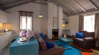 Apartment cottage, hydrangeas and Panama hat, blue carpet, Quinta das Vinhas vineyard, Madeira island