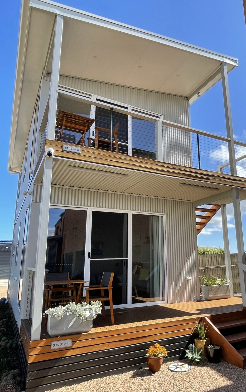 Studio 2 (lower level) and Studio 3 (upper level). Studio 3 private balcony