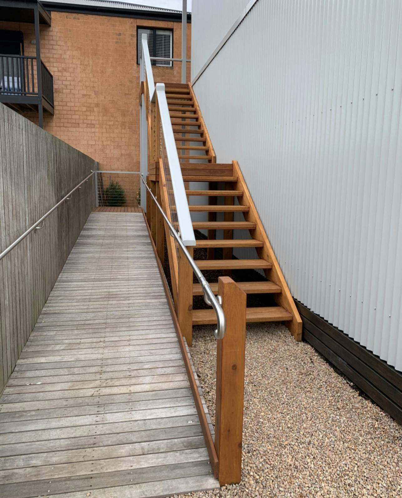 External staircase leads up to Studio 3 (balcony room)