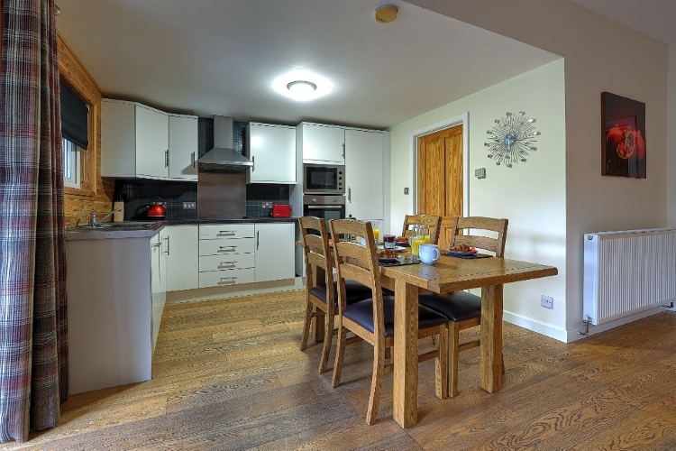 Kitchen and Dining Area, Uredale Lodge at Riverside Lodges in Ripon
