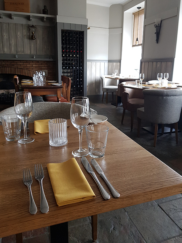 Table set up up in the Boatshed Restaurant in the Royal Hotel, Stornoway, Isle of Lewis
