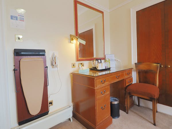 Vanity unit with mirror and stool in the Royal Hotel, Stornoway on the Isle of Lewis