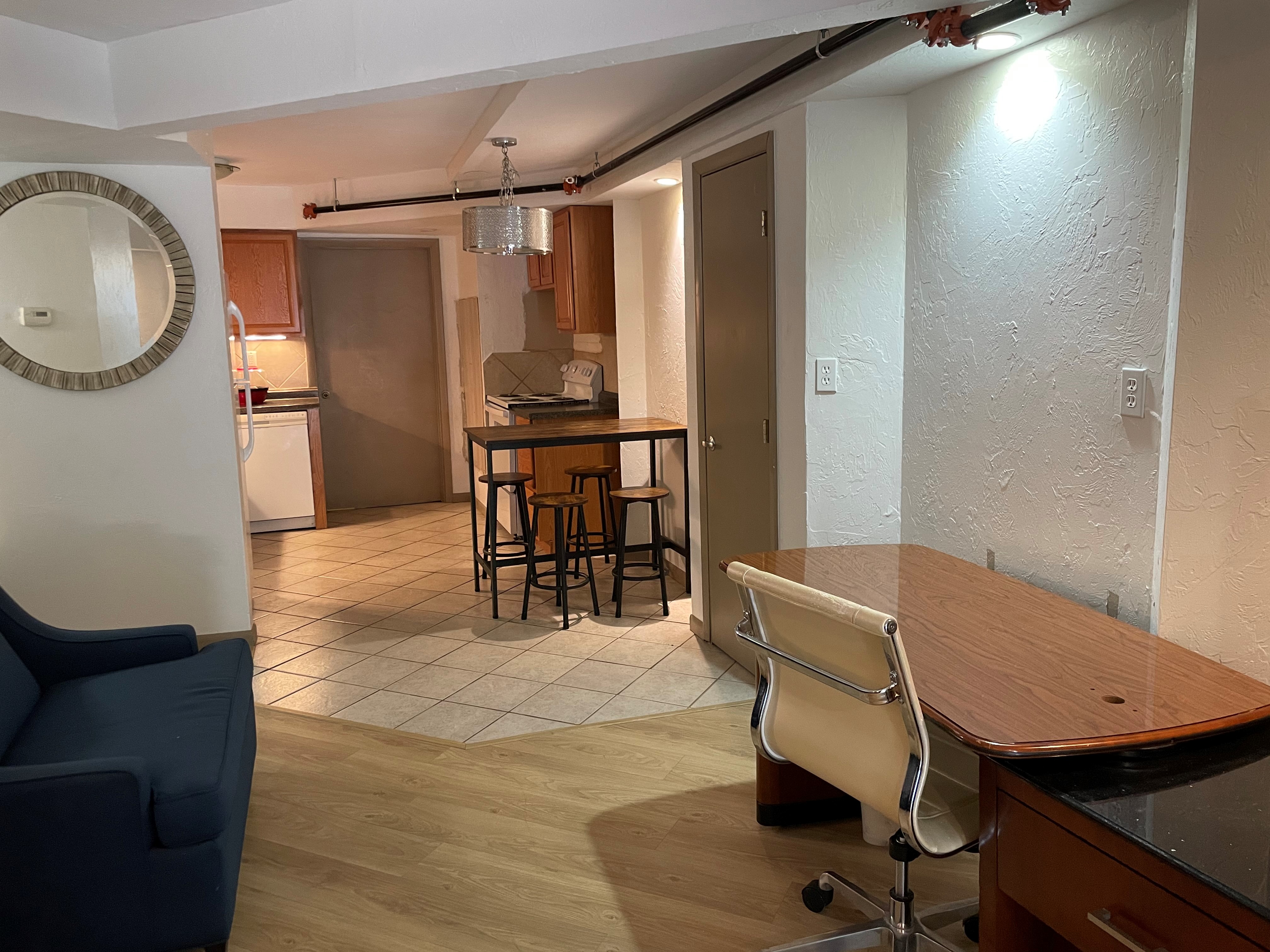 Standard Suite Type 11 living room at WangShi Palace — spacious seating area with TV and balcony access.