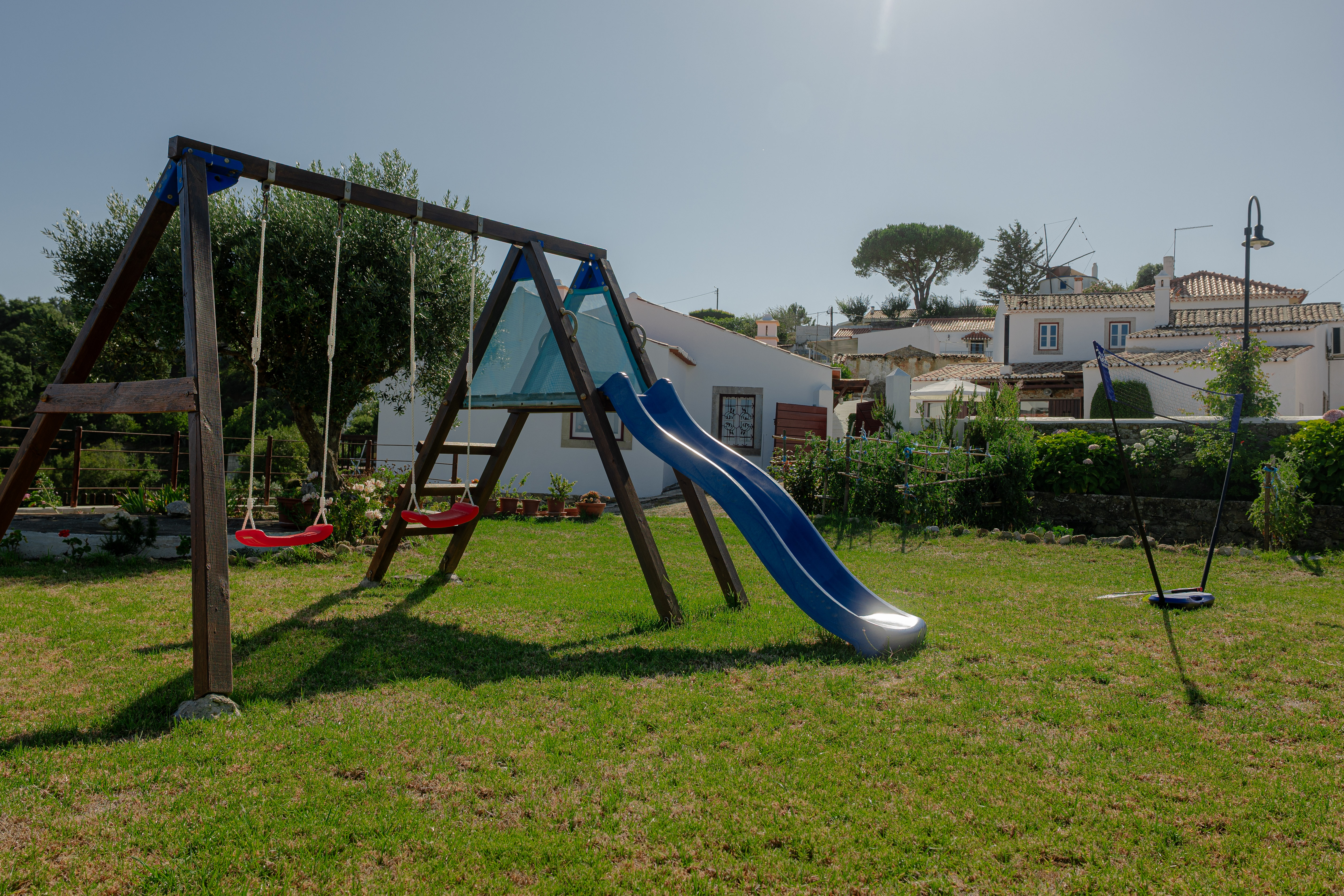 Casas da Tia Alice - Cozinha de verão e playground