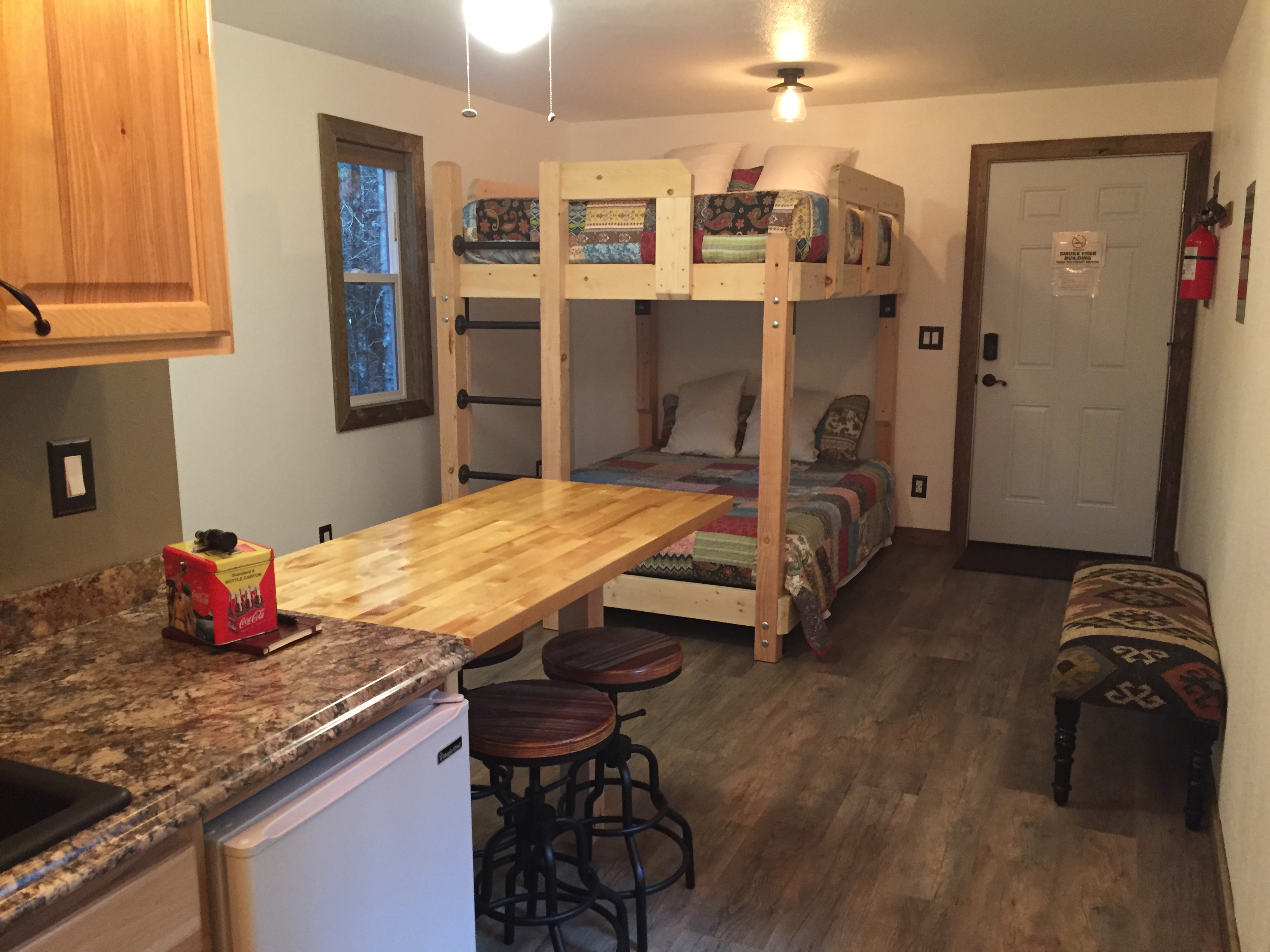 Cabin #7 Dining area and Queen Bunk Bed