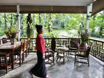 personel walking by at restaurant Monoceros Resort, Chiang Mai