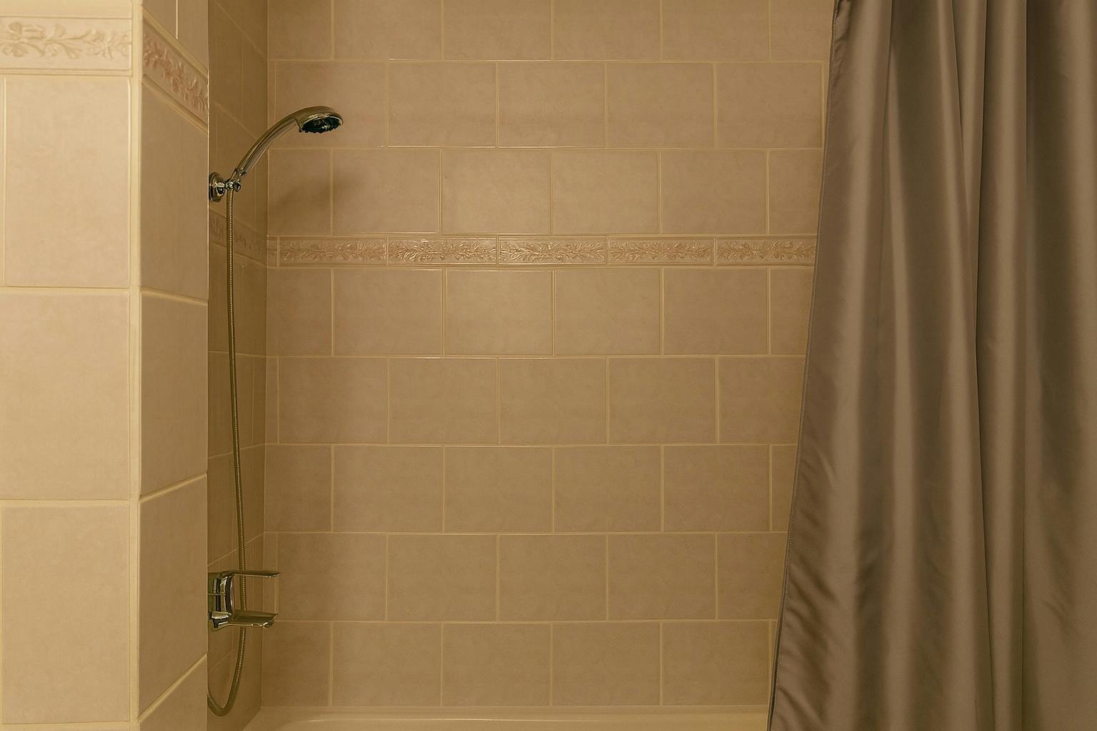 Private shower in Hotel Amager junior suite with modern fixtures, Copenhagen Denmark