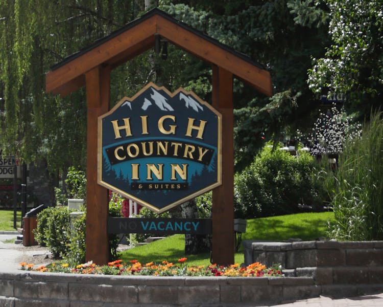 Banff High Country Inn Hotel Pool Resort Best Stay skiing Front Desk to do in Banff scenery mountains hiking flowers trails