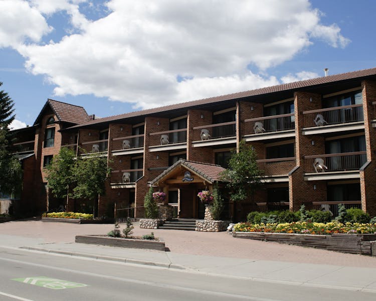 Banff High Country Inn Hotel Pool Resort Best Stay skiing Front Desk to do in Banff scenery mountains hiking flowers trails