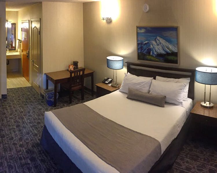 Banff High Country Inn Hotel luxury rooms Suite King Queen Bed Pool Resort Best Stay Front Desk mountains hiking
