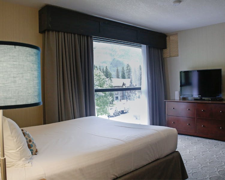 Banff High Country Inn Hotel luxury rooms Suite King Queen Bed Pool Resort Best Stay Front Desk mountains hiking